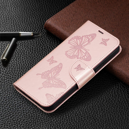 For iPhone 16 Plus Embossing Two Butterflies Pattern Leather Phone Case(Rose Gold) - iPhone 16 Plus Cases by buy2fix | Online Shopping UK | buy2fix