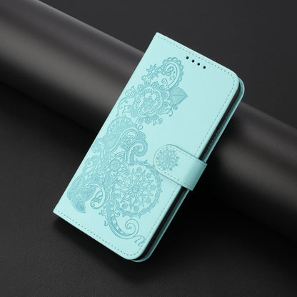 For Motorola Edge 5G 2024 Datura Flower Embossed Flip Leather Phone Case(Light Blue) - Motorola Cases by buy2fix | Online Shopping UK | buy2fix